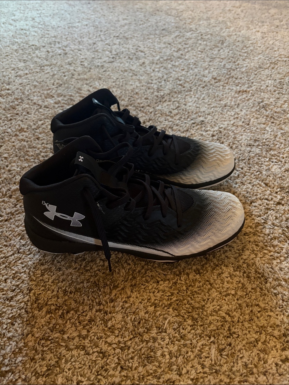 Under Armour Black and White Gradient Mid-Top football cleats